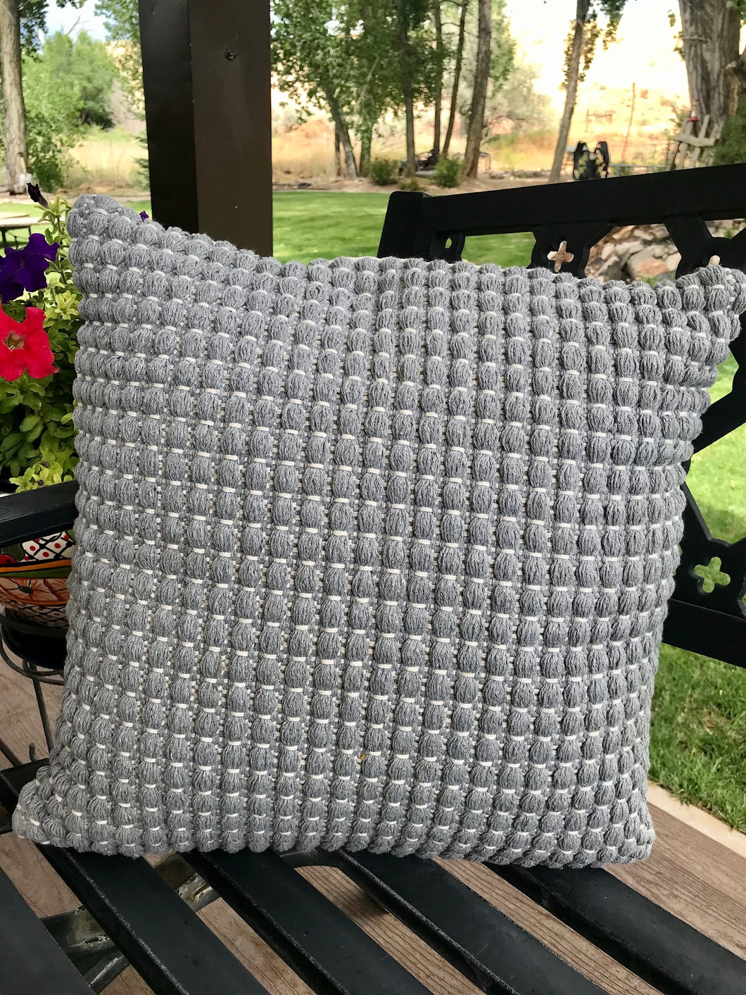 Gray woven pillow